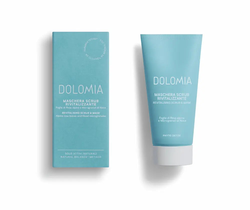 Dolomia Maschera Scrub Rivitalizzante, revitalisierende Peeling-Maske, hellblaue Tube mit weißem Verschluss neben Faltschachtel