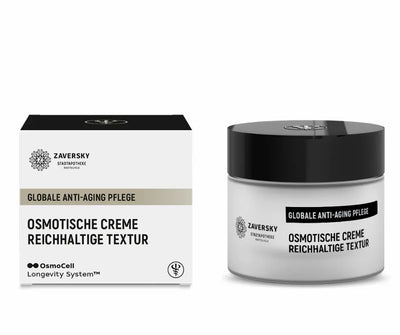 Zaversky Stadtapotheke Osmotische Creme reichhaltige Textur, weißer Tiegel mit schwarzem Deckel neben Faltschachtel, globale Anti-Aging Pflege